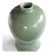 an elegantly-shaped chinese celadon crackle-glazed mei ping (plum) vase