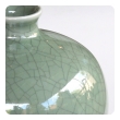 an elegantly-shaped chinese celadon crackle-glazed mei ping (plum) vase