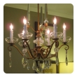 an elegant french 1940's gilt metal 6-light chandelier with crystal pendants