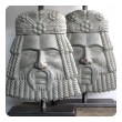 a well-carved and stylized pair of italian romanesque style gray painted wooden masks now mounted as lamps