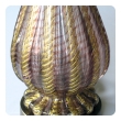 a good quality pair of murano mid-century aubergine and gold aventurine ribbed glass lamps