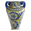 a thickly-modeled italian tin-glazed earthenware polychrome (majolica) double handled vase; possibly florence