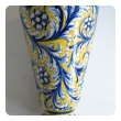 a thickly-modeled italian tin-glazed earthenware polychrome (majolica) double handled vase; possibly florence