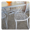 a stylish american 1960's five piece aluminum patio set with square glass-top table and 4 side chairs; by brown jordan