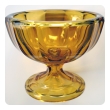 a heavy and thickly-modeled bohemian mid-century pedestal bowl of honey-colored glass; by moser glassworks