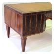  handsome and boldly-scaled french macassar-veneered pedestal desk