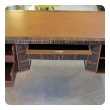  handsome and boldly-scaled french art deco macassar-veneered pedestal desk