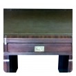 handsome english campaign 9-drawer mahogany desk with sage green leather writing surface