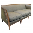 shapely american mid-century T.H. Robsjohn-Gibbings style sofa with flared openwork arms