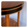 sleek and stylish american mid-century modern ash circular side table with ebonized highlights