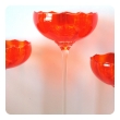 vibrant set of 3 murano 1960's orange glass compotes on clear glass stems