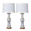elegant pair of 19th century chinese baluster form vases now mounted as lamps with gilt decoration on a white ground