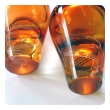  exceptional pair of Kosta Boda Swedish orange art glass vases; designed by Klas-Goran Tinback