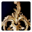 elegant and superbly-carved english george II giltwood mirror with elaborate foliate crest