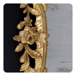 elegant and superbly-carved english george II giltwood mirror with elaborate foliate crest