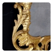 elegant and superbly-carved english george II giltwood mirror with elaborate foliate crest