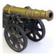 a finely rendered english victorian brass ornamental cannon on cast iron carriage