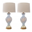 an ethereal pair of american 1960's frosted ice-blue glass baluster-form lamps with raised floral decoration