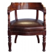 dramatically-carved and handsome french restoration mahogany barrel-back desk chair with bold acanthus leaves