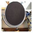 chic american art deco 1930's steel dressing mirror raised on a maplewood base with ebonized highlights 