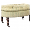 handsome english late 19th century oval ottoman/stool with turned legs and casters 