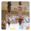 chic pair of murano gold-aventurine 6-light chandeliers with ruby-red trim
