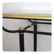 a good quality french 1950's brass and black metal console table with beveled glass top and lower shelf