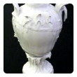 finely rendered pair of french rococo style blanc-de-chine urns/vases 