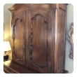 an impressive french provincial walnut buffet-a-deux-corps/cabinet