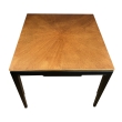 Top view of mid-century Baker ebonized and oak two-drawer game table showing radial oak veneer
