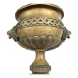 A French Louis XVI Style Brass Pedestal Urn with Lion Mask Handles 