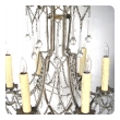 an elegant and graceful pair of italian 1960's cage-frame beaded 6-light chandeliers with tear drop crystal pendants