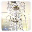 an elegant and graceful italian 1960's gilt-bronze and crystal 5-light chandelier