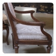 an exquisite and large-scaled pair of italian neoclassical carved walnut upholstered arm chairs