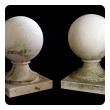 a stately pair of french neoclassical style carved limestone orb-form garden elements