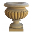 A Large-scaled French Neoclassical Carved Limestone Gadrooned Urns