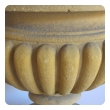 A Large-scaled French Neoclassical Carved Limestone Gadrooned Urns