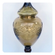 a striking and large bohemian russet-colored glass covered urn