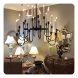 stylish 1960's black enameled metal 12-arm candelabra style chandelier attributed to Tommi Parzinger 
