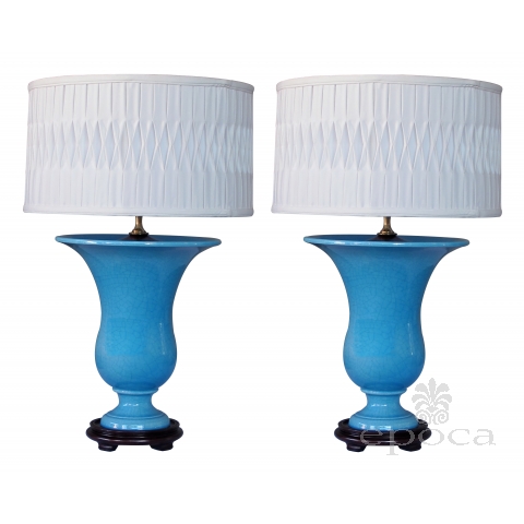 a striking and robust pair of french art deco turquoise crackle-glazed urns now mounted as lamps