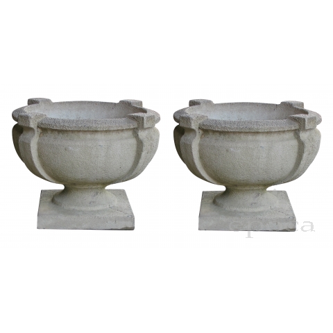 a handsome pair of cast stone garden urns 