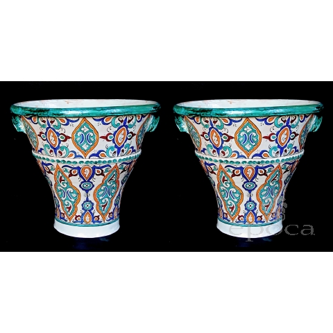 a large and vibrantly glazed pair of Moroccan conical-form double-handled pot