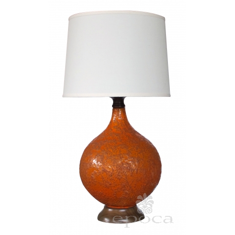 a large and iconic american 1960's burnt-orange crater-glazed lamp