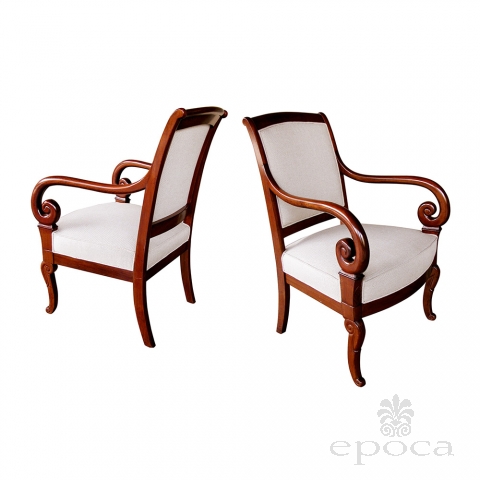 a gracefully proportioned pair of french restauration mahogany armChairss
