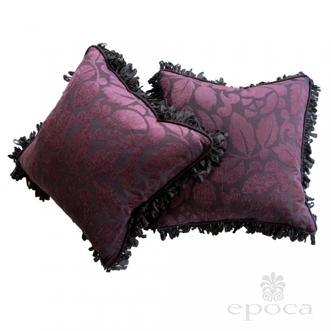 a sumptuous pair of aubergine cut velvet pillows with silk ribbon fringe
