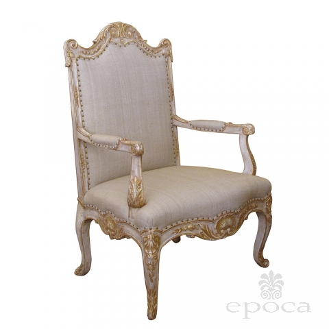 a baronial and well-carved french regence style ivory painted and parcel-gilt open armChairs
