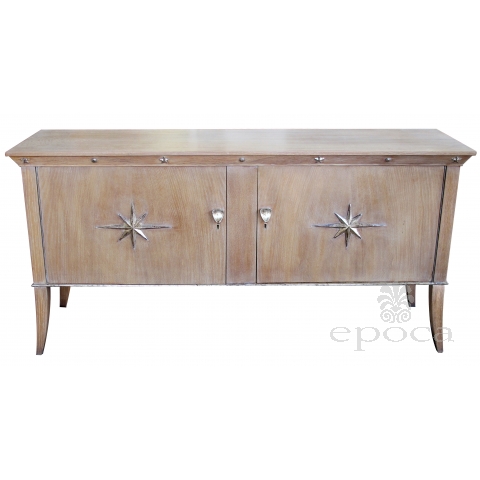 a stylish french mid-century 2-door cerused oak sideboard with silver-leaf star relief motifs