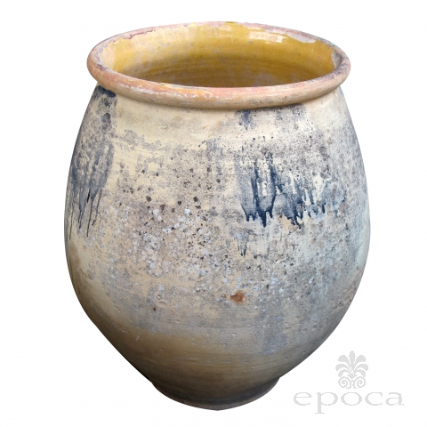 a large french earthenware confit pot with yellow-glazed interior