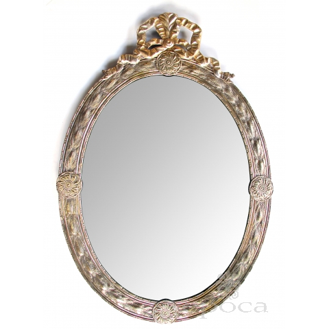 a handsome and large-scaled continental neoclassical style silver repousse oval mirror