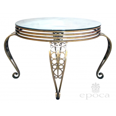 a shapely french art deco gilt iron circular table with mirrored top